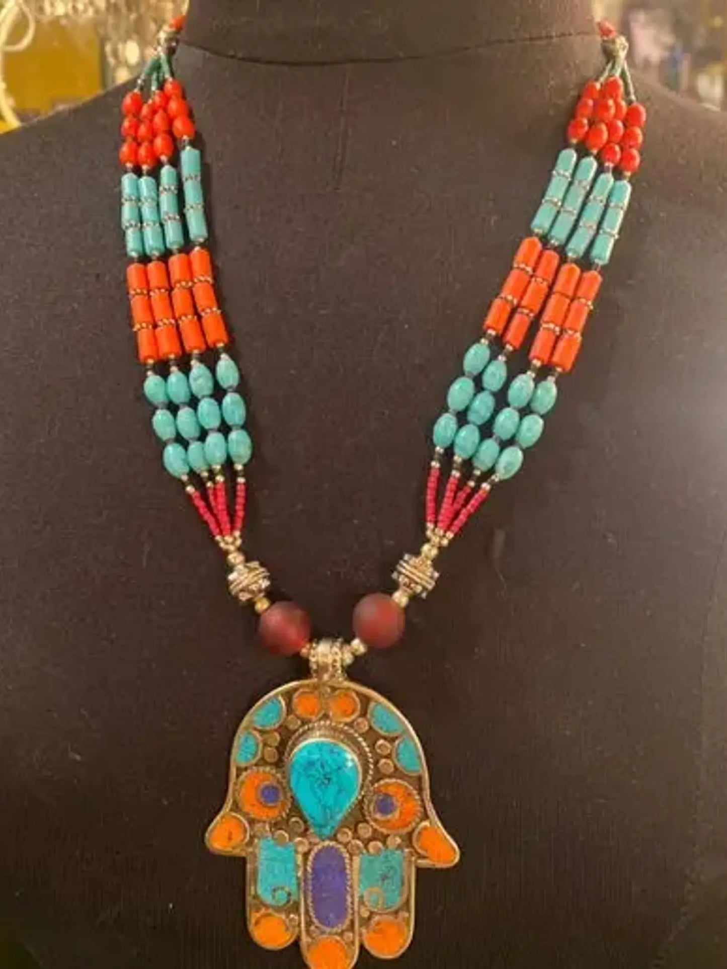 Turquoise and coral Hamsa