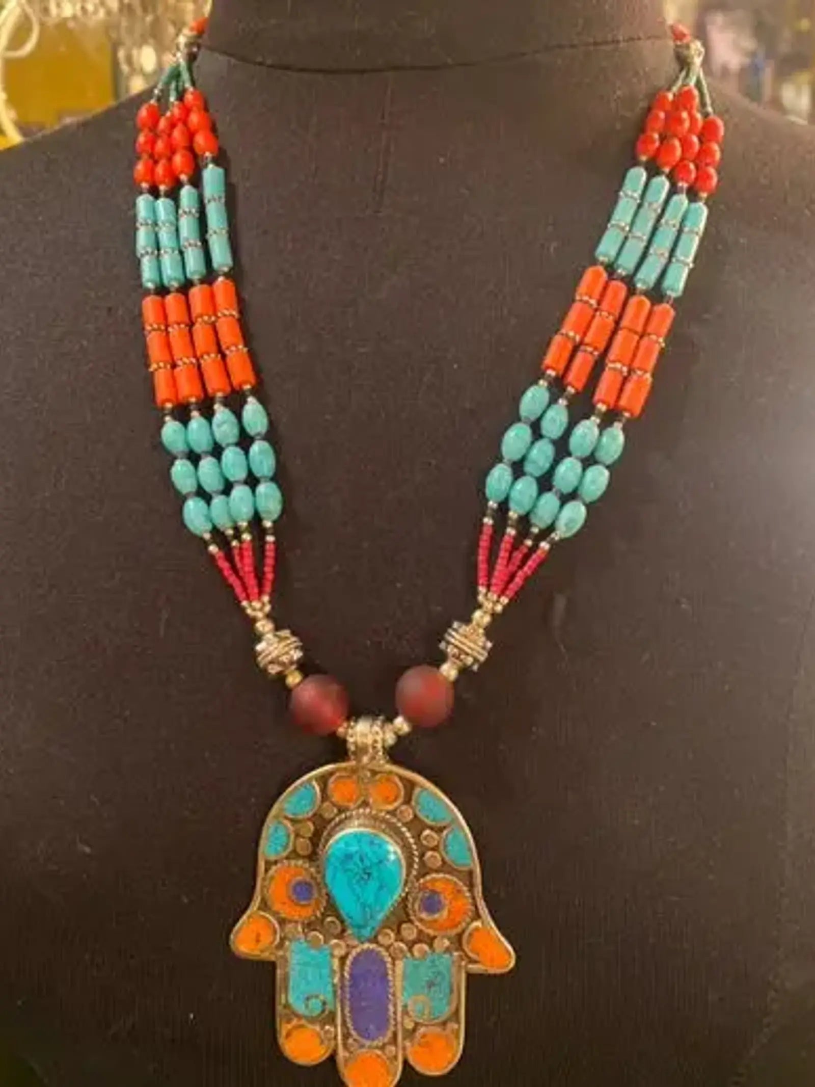 Turquoise and coral Hamsa