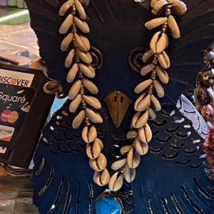 Cowrie shell necklace with turquoise drop